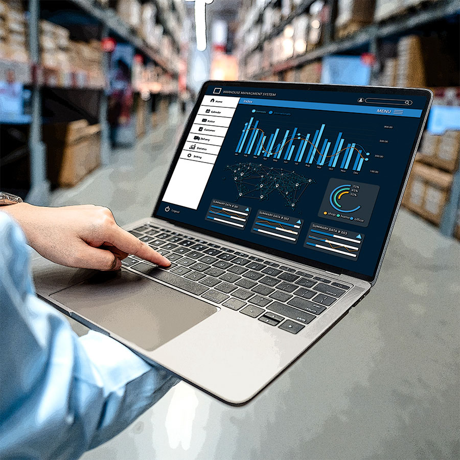 A complex desktop application running on a laptop in a warehouse